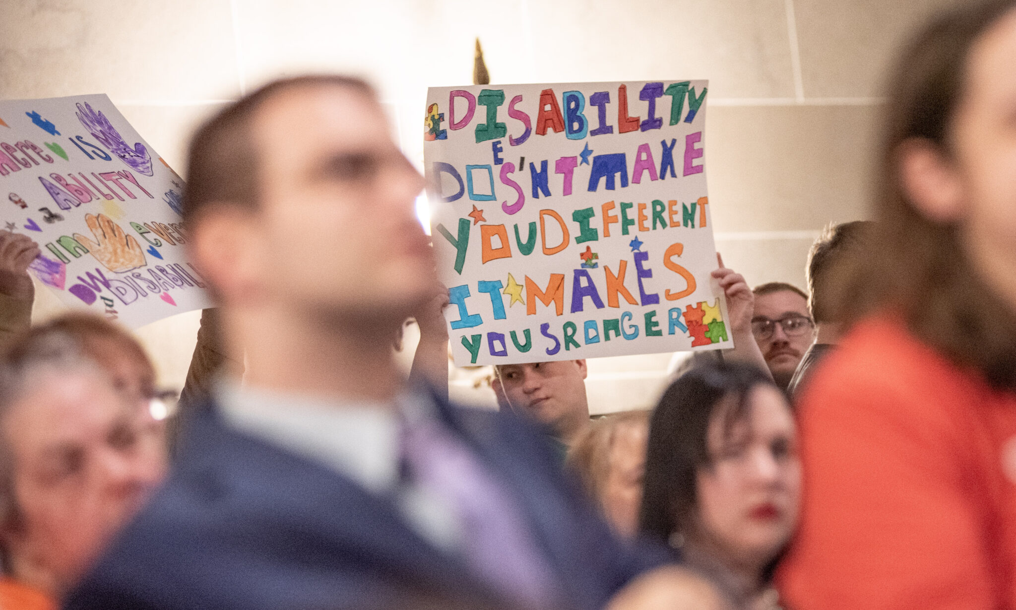 disability rights advocates protesting at the missouri state capitol building